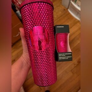 Metallic pink, hot pink Starbucks cup, and matching keychain